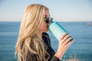Healthy lifestyle tips include drinking enough water. (Image via Unsplash/ Bindle Bottle)